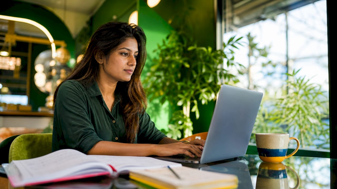 Digital marketer reviewing SEO report at desk